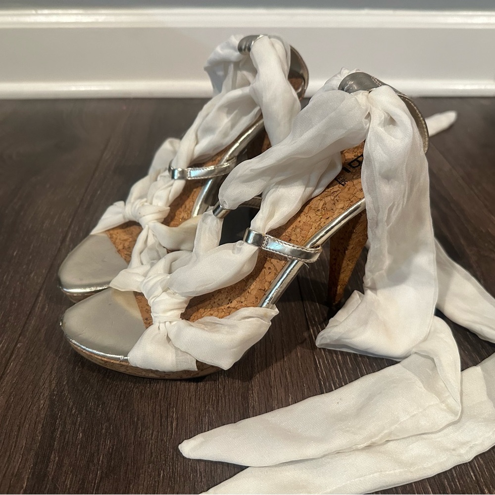 Bakers heals with lace tie around leg